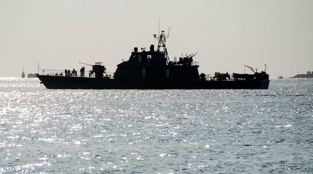 One of two Iranian navy warships arrives to dock at Port Sudan in the Red Sea state