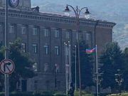 Алиев поднял азербайджанский флаг в оккупированном Степанакерте